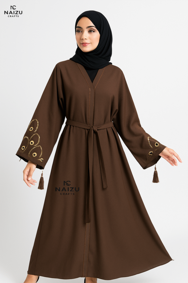A unique brown embroidered abaya featuring elegant peacock feather motifs